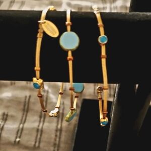 A trio of matching bracelets by Seasonal Whispers, large blue pieces real stone